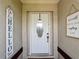 Inviting front entryway with charming decor creating a warm and welcoming atmosphere at 3110 Short Leaf Pine Ct, Kissimmee, FL 34746