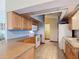 The kitchen includes wood cabinets, neutral countertops, and ceramic tile flooring at 3110 Short Leaf Pine Ct, Kissimmee, FL 34746