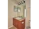 This bathroom offers a vanity with an integrated sink and ample storage at 3151 Sinclair St # 104, Orlando, FL 32835