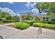 Community clubhouse with well-maintained landscaping and inviting entrance at 3151 Sinclair St # 104, Orlando, FL 32835