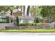 Stonebridge Place entrance sign with stone base, manicured landscaping, and attractive lamp posts, providing a welcoming community feel at 3151 Sinclair St # 104, Orlando, FL 32835