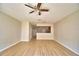 Inviting living room features ceiling fan, an open design to the kitchen for easy entertaining at 3151 Sinclair St # 104, Orlando, FL 32835