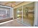 The patio showcases sliding glass doors leading into the living space, seamlessly blending indoor and outdoor living at 3151 Sinclair St # 104, Orlando, FL 32835