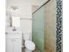 Bathroom featuring vanity, mirror and toilet with glass shower at 3170 Zaharias Dr, Orlando, FL 32837