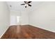 Bedroom with hardwood floors and crown molding with white doors at 3170 Zaharias Dr, Orlando, FL 32837
