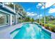 The screened-in pool and patio provides ample space for outdoor relaxation and fun at 3170 Zaharias Dr, Orlando, FL 32837