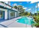 Sparkling screened-in pool and patio extends the living space for year-round enjoyment at 3170 Zaharias Dr, Orlando, FL 32837