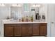 This bright bathroom features a double sink vanity with plenty of storage and ample counter space at 3378 Sagebrush St, Harmony, FL 34773