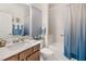 Modern bathroom with a double vanity, a toilet and a shower tub combination at 3378 Sagebrush St, Harmony, FL 34773