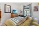 Bedroom with a TV, soft lighting, and a comfortable bed at 3378 Sagebrush St, Harmony, FL 34773