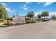 Entrance to South Lake, featuring a decorative sign, manicured landscaping, and secure gated access for residents at 3378 Sagebrush St, Harmony, FL 34773