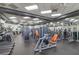 Well-equipped gym with treadmills, elliptical machines, and weight stations, offering a diverse range of fitness options at 3378 Sagebrush St, Harmony, FL 34773