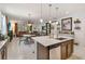 Spacious open floor plan with kitchen, dining, and living areas, perfect for entertaining at 3378 Sagebrush St, Harmony, FL 34773