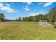 Community soccer field with well-maintained lawn and goal posts, perfect for sports and recreation at 3378 Sagebrush St, Harmony, FL 34773