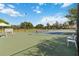 Well-maintained tennis courts surrounded by a fence, providing a great recreational amenity at 3378 Sagebrush St, Harmony, FL 34773