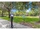 Electric vehicle charging station available in the green, landscaped community at 3425 Middlebrook Pl, Harmony, FL 34773