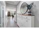 Bright foyer featuring a decorative mirror, decor and tiled flooring at 3425 Middlebrook Pl, Harmony, FL 34773