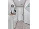 Bright foyer featuring a decorative mirror, decor and tiled flooring at 3425 Middlebrook Pl, Harmony, FL 34773