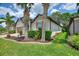 Expansive backyard featuring lush green grass, mature trees, and a private, serene setting at 352 Alicante Ct, Davenport, FL 33837