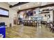 Stylish bar area with a stone backsplash, ample seating, and a welcoming atmosphere at 352 Alicante Ct, Davenport, FL 33837