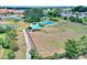 A neighborhood park offers a variety of recreational activities, including tennis and a playground at 352 Alicante Ct, Davenport, FL 33837