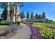 View of community entrance featuring a beautiful landscape, signage, and paved walkway at 352 Alicante Ct, Davenport, FL 33837