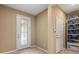 Bright foyer with tile flooring, decorative glass front door, and ample storage space at 352 Alicante Ct, Davenport, FL 33837