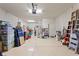 Spacious two-car garage with epoxy floors, ample storage, and a clean, organized layout at 352 Alicante Ct, Davenport, FL 33837