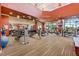 Well-equipped gym with various machines, weights, and exercise equipment for a complete workout at 352 Alicante Ct, Davenport, FL 33837