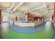 Spacious recreation room features a walking path and multiple leisure areas at 352 Alicante Ct, Davenport, FL 33837