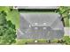 Aerial view of the roof showcasing its unique architecture and detailing, surrounded by well-maintained landscaping at 352 Alicante Ct, Davenport, FL 33837