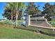 Community signage with the golf course in the background at 352 Alicante Ct, Davenport, FL 33837