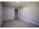 This bedroom has a closet and features clean lines and light wood-look flooring at 453 E Jessup Ave, Longwood, FL 32750