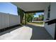 The carport has a concrete floor and offers covered parking at 453 E Jessup Ave, Longwood, FL 32750