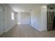 Spacious and modern living area featuring new flooring, fresh paint, and ample natural light with an open floor plan at 453 E Jessup Ave, Longwood, FL 32750