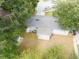 Overhead shot of home showing backyard, detached garage and mature trees at 4760 Danzig Ct, Orlando, FL 32811