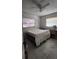 Bedroom with tiled flooring, ceiling fan, and window at 4760 Danzig Ct, Orlando, FL 32811