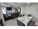 Dining room and living room with tile flooring and an open floor plan at 4760 Danzig Ct, Orlando, FL 32811