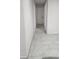 Hallway with tile flooring and white walls at 4760 Danzig Ct, Orlando, FL 32811