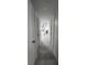 Hallway has gray tile flooring and white walls at 4760 Danzig Ct, Orlando, FL 32811