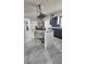 The kitchen island has a marble countertop, stainless steel appliances, and gray backsplash at 4760 Danzig Ct, Orlando, FL 32811
