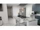 The kitchen island has a marble countertop, stainless steel appliances, and gray backsplash at 4760 Danzig Ct, Orlando, FL 32811