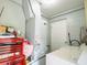 Laundry room with washer, dryer, and ample storage space at 4760 Danzig Ct, Orlando, FL 32811