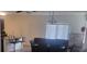Bright, open living area with updated laminate flooring, breakfast bar, and dining space at 4819 Apple Blossom Ln, St Cloud, FL 34771