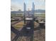 Community playground with slide, climbing structure, and a view of the lake at 4819 Apple Blossom Ln, St Cloud, FL 34771