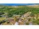 Aerial view of homes and lush landscape, highlighting the natural beauty and peacefulness of the rural location at 4885 Meadow Dr, St Cloud, FL 34772
