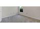 A bright bedroom featuring carpet floors at 4885 Meadow Dr, St Cloud, FL 34772