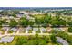 An aerial perspective of a home nestled in a serene residential area, highlighting community layout at 5426 Astor St, Leesburg, FL 34748