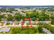 Aerial view of a single Gathering home in a quiet residential neighborhood at 5426 Astor St, Leesburg, FL 34748