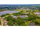 Overhead view of the community with a pool, tennis courts, and baseball field at 5426 Astor St, Leesburg, FL 34748